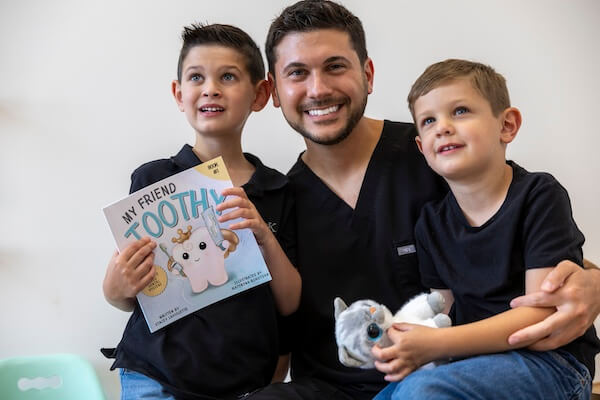 dentist-with-2-young-boys