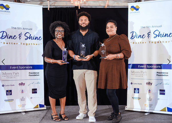 dine and shine team holding awards